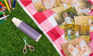 family photos and art supplies on checked blanket outdoors- montaging - summer children's activity idea