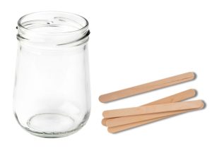 empty jam jar next to craft lolly sticks - lucky dip children's activity idea