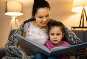 mum reading to child - tip to reduce screen time